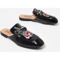 Cheska Floral Embroidered Flat Mule In Black Patent, Black