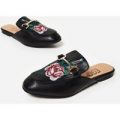 Cheska Floral Embroidered Flat Mule In Black Faux Leather, Black