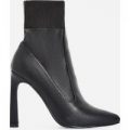Elaina Flared Stiletto Heel Ankle Sock Boot In Black Faux Leather, Black